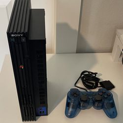 Ps2 with transparent blue controller 