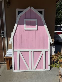 Large pink barn backdrop and decorations
