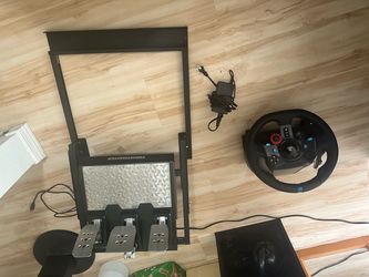 Logitech G29 steering wheel with Thrustmaster T3PM pedals