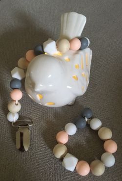 Pacifier clips and teething clips and teething bracelets