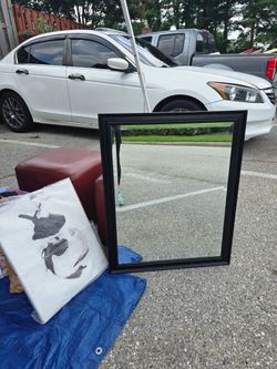 Wood frame wall mirror