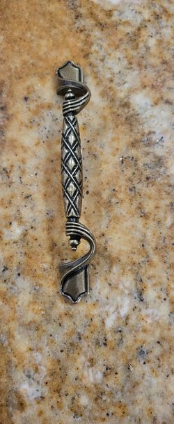 Beautiful Brass Cabinet Handles.