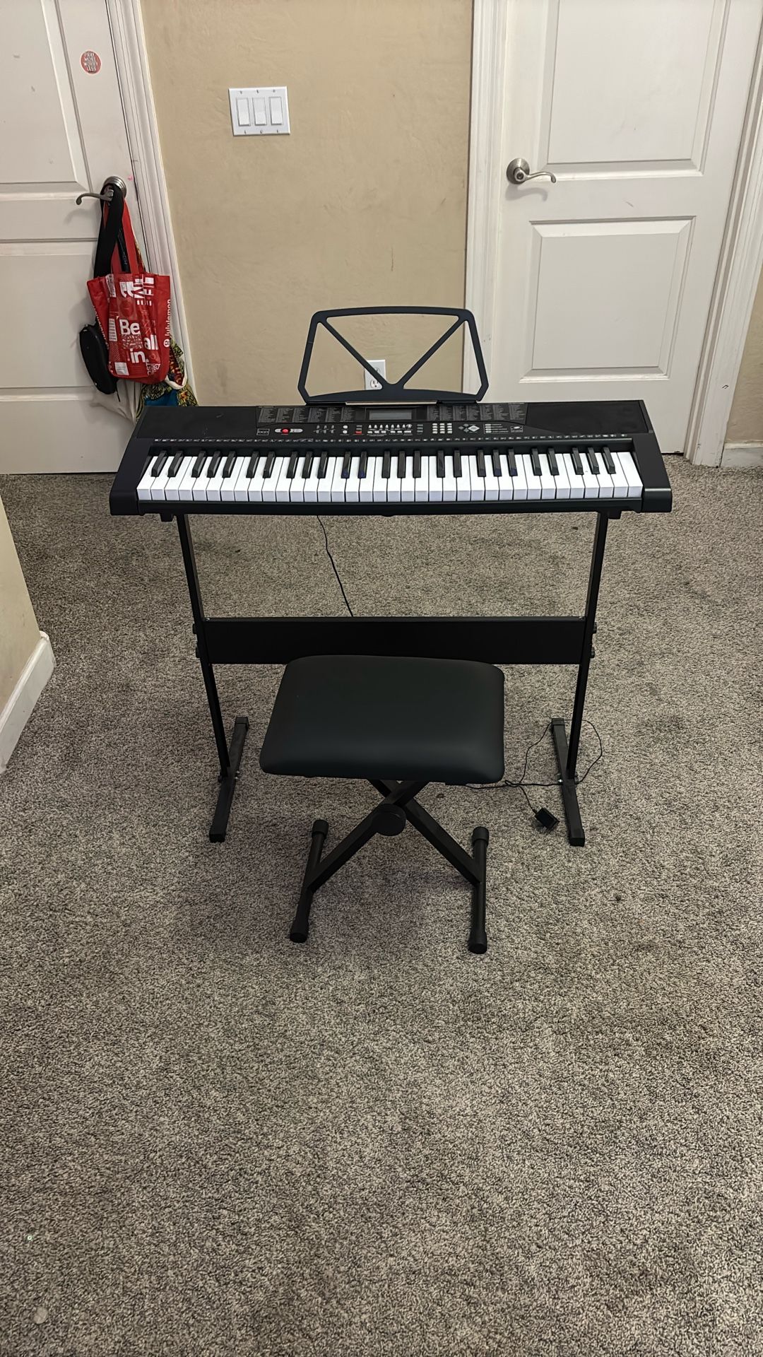 Black Piano Keyboard And Bench
