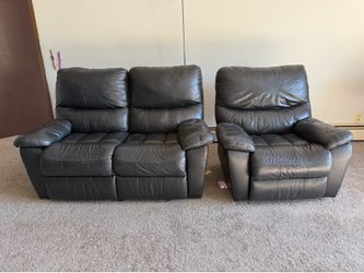 Ashley Brand - Black Leather Reclining Loveseat + Single rocking full recliner seat.