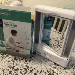 Make up mirrors with a light shower, hang long one brand-new in the box, $50 both