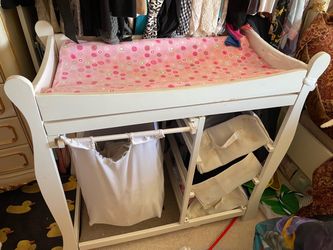 White Changing Table with Pink Pad