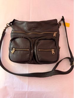 Liebeskind Berlin Black Leather Anny crossbody bag features a soft leather exterior with prominent front utility pockets
