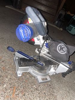 Kobalt 7 1/4 chop saw with saw horse