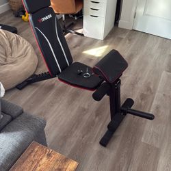 Reclining weight bench With leg extension
