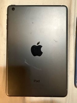 Apple iPad Mini Space Gray and 2 android phones