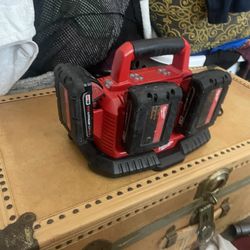 Milwaukee Multi Charger And Three Battery’s 