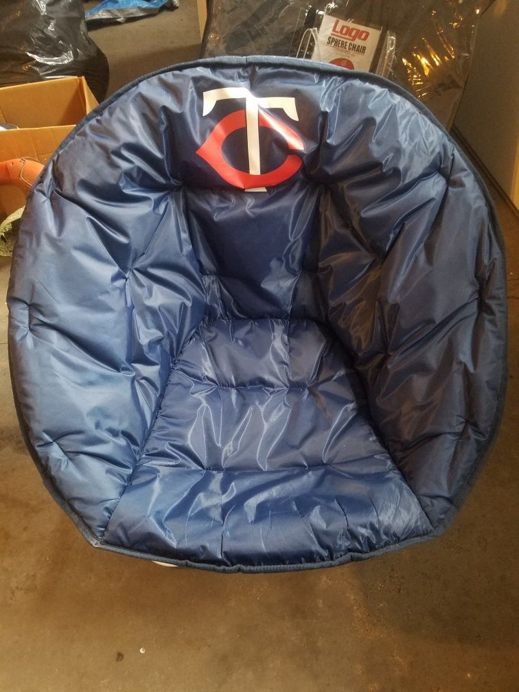 Adult sized MN Twins saucer/collapsible chair with carrying bag. Brand New, price reduced! $30.00 Must meet in on Eagan or Inver Grove Heights.