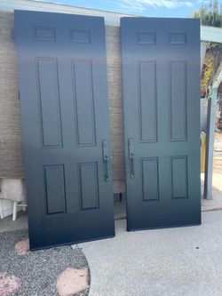 Entrance Front double door solid - with frame / keys - 95 each long / 36 inches each door . Matte black color is exterior and white is interior of th