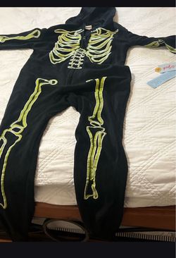 Skeleton onesie it glows in the dark