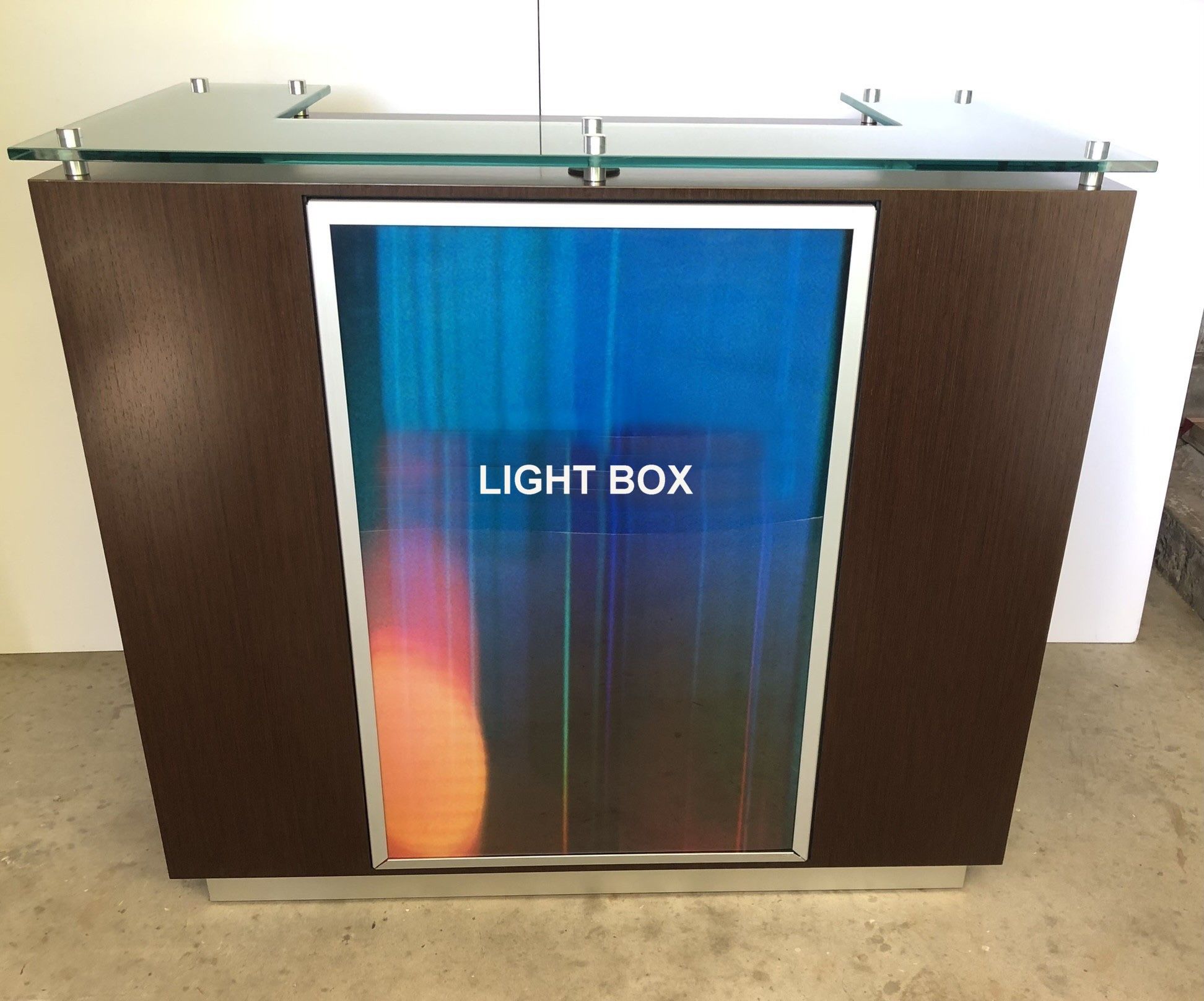 Reception counter with a frosted glass top, wenge wood - Front Features A Backlit Logo Box