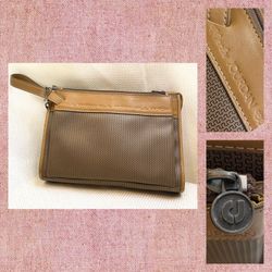 Vintage Charles Jourdan locking pouch wristlet. Rare locking pouch with 2 keys. Measurements are in the photos. This is in great condition! No musty o