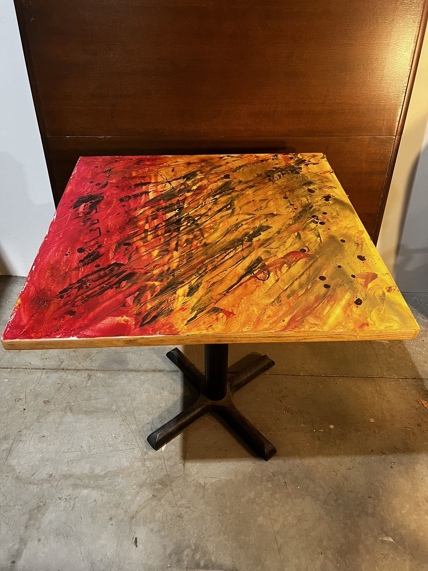 small cafe style table with iron base