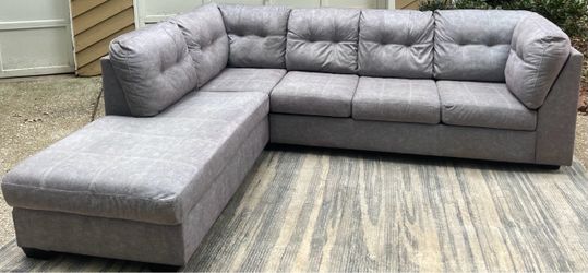 Gray 2pc Ashley Furniture Sectional w/chaise