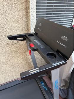 Treadmill with workstation