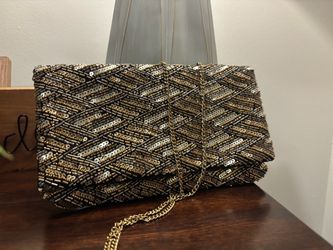 Gold and black breaded purse