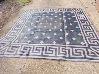 Prices firm.. 8 ft x 8 ft reversible patio carpet