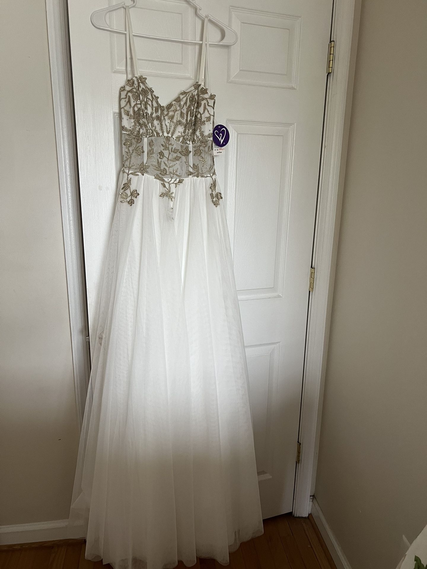 Formal Dress $50. Wedding Dress $100