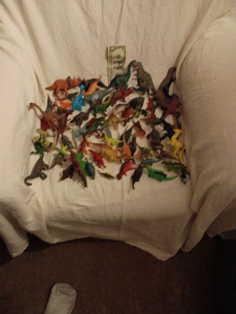 (65) Random Plastic Toy Dinosaurs..