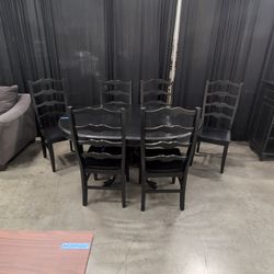 Round Pedestal Base Dining Table in Black Wood