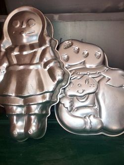 2 CAKE PANS STRAWBERRY SHORTCAKE AND RAGADY ANN.  BOTH FOR $10.00