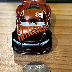 DISNEY PIXAR CARS TIM TREADLESS - ORANGE & BLACK DIECAST NEW CONDITION CAR
