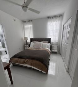 Grey Upholstered Bed