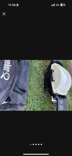 WEBER portable grill works great with cover and wheels $120