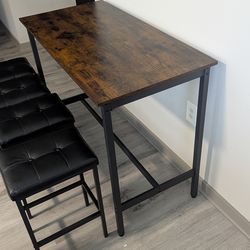 High top table and 4 stools