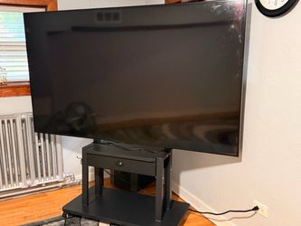 80” Sharp TV with rollable stand