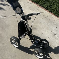 Used CaddyTek 4 Wheel Golf Push Cart - Caddycruiser One Version 8 1-Click Folding Trolley - Lightweight, Compact Pull Caddy Cart, Easy to Open