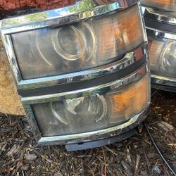 2014 Chevy Silverado 1500 Driver and Passenger Side Black Factory Style Headlights. Brand New, Never Used. 