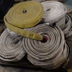 Stack Of Fire Hoses With Ends.  50 Bucks Each