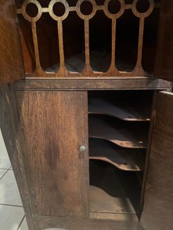 Vintage Dark Wood Cabinet with Decorative Lattice Top