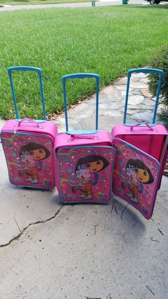 3 Dora the Explorer suitcases