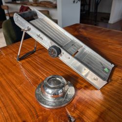 Stainless steel mandolin slicer with hand guard