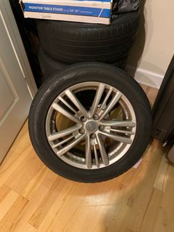 OEM Infiniti G37 rims and Yokohama tires with decent tread (missing bolts)