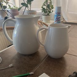 Two White Pitchers