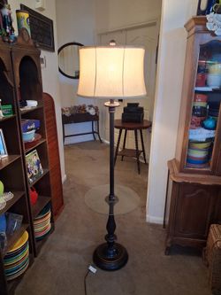 Lamp with built in glass table