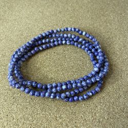 Natural stone beads purple name unknown can be worn as necklace or bracelet