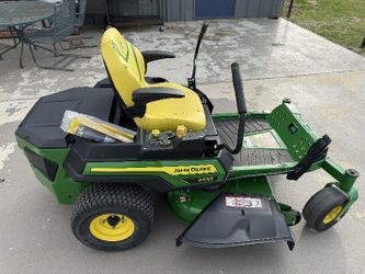 The John Deere Z370R Electric ZTrakâ„¢ mower has a list price of $6,499 USD, plus any additional dealer charges. It features a 3.2 kWh lithium-ion batte
