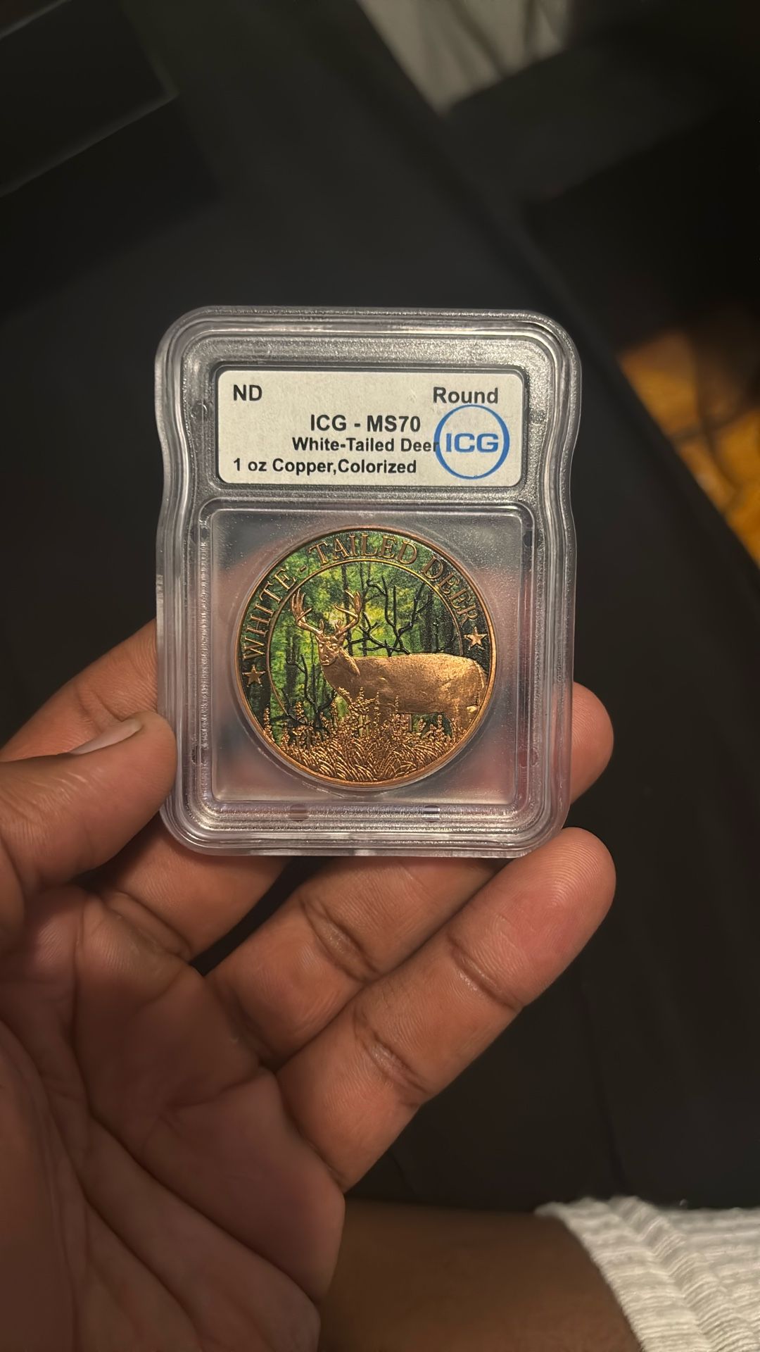 1 oz colorized copper round featuring a White-Tailed Deer