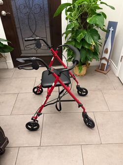 Like new walker on wheels with seat