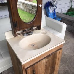 Ceramic bathroom cabinet and medicine cabinet with mirror.