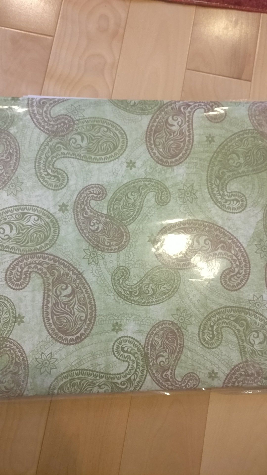 Green paisley scrapbook with pages