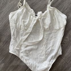 white ruffle bodysuit 
